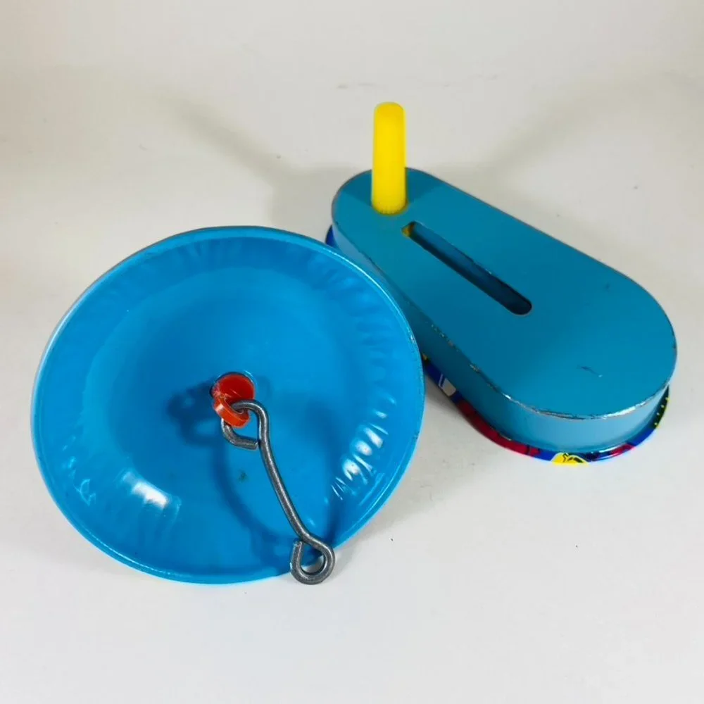 Two vintage tin New Years Eve royal blue cocktail New Years print noise makers.